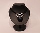 Necklace with 
leather  strap 
and large 
pendant of 
silver with 
onyx stone.
48 cm and 6 cm 
x 5 cm.