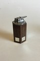 Hans Hansen 
Rosewood and 
Sterling Silver 
Hexagonal 
Lighter. 
Measures 10 cm 
/ 3 15/16 in.