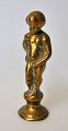 Seal in brass, 
Manneken Pis, 
19th century. 
Height: 8.5 cm.