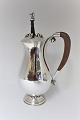 Georg Jensen. 
Chocolate jug 
with stirrer. 
Sterling (925). 
Model 460B. 
Design Georg 
Jensen. ...