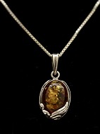 Sterling silver necklace with amber pendant sold