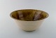 Ivy Lysdal, b. 1937. Danish ceramist and painter.
Large unique bowl with uranium glaze. 1970