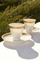 Espresso cup 
with saucere, 
RC. Fan gold 
Royal 
Copenhagen 
porcelain. 
Royal 
Copenhagen Fan 
gold,  ...