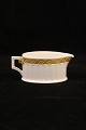 Cream jug in Gold Fan from Royal Copenhagen.
H: 4cm. L: 10cm.