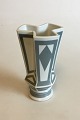 Bing & Grondahl 
Curved vase by 
Lisa Enquist No 
5818/1898. 
Measures 19.5 
cm / 7 43/64 
in.
