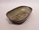 Ceramic dish in 
dark colours of 
danish design, 
stamped TR, 
from the 1960s. 
The dish is in 
great ...