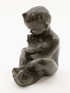Bronze figure boy with fish