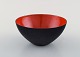 Krenit bowl by Herbert Krenchel. Black metal and red enamel.
1970
