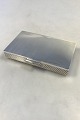 Georg Jensen 
Sterling Silver 
Sigvard 
Bernadotte Box 
w Lid No 712 
Measures  H 2.3 
cm x L 13.5 cm 
...