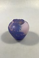 Emile Gallé: 
Vase of rose 
frosted glass, 
overlaid with 
bluish purple 
glass carved 
with flowers 
...