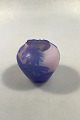Emile Gallé: 
Vase of rose 
frosted glass, 
overlaid with 
bluish purple 
glass carved 
with flowers 
...