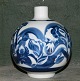 Pure Art Deco: 
Vase in 
porcelain from 
Bing & Grondahl 
with blue 
organic 
decoration on 
the white ...
