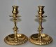 Pair of brass 
candles, 19th 
century 
Denmark. With 
drip bowl. H: 
20 cm.