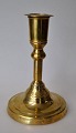 Brass 
chandellier. 
century 
Denmark. Round 
foot and 
profiled stem. 
H: 13 cm.