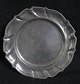 A pair of 
pewter plates, 
18th century. 
Crooked cut, 
Germany. 
Stamped: I.C.R. 
Zinn, 1742. 
Stamped ...