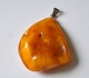 Amber pendent, 
Denmark. Milk 
amber. 
Polished. 5 x 4 
cm. Weight: 
13.4 grams.