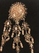 Brooch. 3 row 
of filigree.
silver 830 TJ 
(Tage Jansen - 
Aarhus 1935 - 
1945).
Height: 10.5 
cm. ...