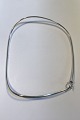 Georg Jensen 
Sterling Silver 
Neck Ring by 
Vivianna Torun 
No 173
Measures 
15,2cm x 12,7cm 
...