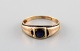 Danish goldsmith. Art deco gold ring with beautiful bluish semi precious stone. 
1930
