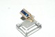 Gold ring with 
blue sapphire 
and white zones 
stone 14 carat 
gold
Punched 585
Size 66
nice and ...
