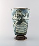 Gunnar Nylund for Rörstrand. Hand crafted art deco Flambé vase. Glaze in blue 
tones, gold lines. Motif of harlequin and columbine. 1936.