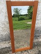 Mirror with 
wide frame in 
teak veneer. 
Dimensions: 
114x52.5 cm
