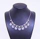 Necklace of 925 sterling silver decorated with 
aquamarine.
5000m2 udstilling.
