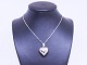 Heart shaped pendant of 925 sterling silver, stamped CORO.
5000m2 showroom.