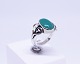 Ring of 830 
silver 
decorated with 
jade stone.
Size - 53.