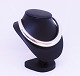 Georg Jensen 
Archive Aura 
neck ring, 
Model 29 A. The 
ring is of 925 
sterling silver 
and designed 
...