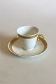 Royal 
Copenhagen Gold 
Fan Mocca Cup 
and Saucer No 
414/11540. 
Measures Cup: 
5.3 cm / 2 3/32 
in. x ...