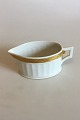 Royal 
Copenhagen Gold 
Fan Creamer No 
414/11541. 
Measures 12.5 
cm / 4 59/64 
in.