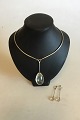 Georg Jensen 
Sterling Silver 
Set consisting 
of Neck Ring No 
114 with 
Pendant of 
Rutil Quartz No 
...