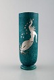Wilhelm Kåge for Gustavsberg. Argenta vase in ceramic decorated with mermaid in 
silver inlaid.