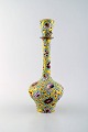Delphin Massier for Vallauris. narrow necked unique art nouveau vase in glazed 
ceramics.