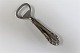 Georg Jensen. 
Rose. Bottle 
opener in 
sterling 
silver. Length 
11.5 cm. 
Produced 
1933-1945.