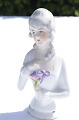 Porcelain 
figurine. Half 
pin cushioon 
doll, woman. 
Height 8.5 cm. 
Fine condition.