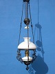 Paraffin lamp 
made by iron, 
opal glass. 
Height 105 cm. 
Bredte 30 cm. 
Fine condition.
