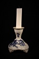 A pair of Royal 
Copenhagen Blue 
Flower curved 
candlestick 
with gold edge. 
Decoration 
number: ...