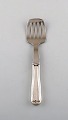 Georg Jensen Old Danish sardine fork in sterling silver and stainless steel.