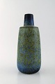 Carl-Harry Stålhane for Rørstrand. Large ceramic vase with beautiful glaze in 
blue / green shades. 1960