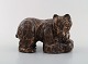 Scandinavian ceramist. Unique figure of brown bear in glazed stoneware. Mid 20th 
century.