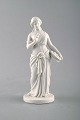 Antique and rare Royal Copenhagen sculpture in biscuit. Sculpture of flower girl 
after Thorvaldsen. Ca. 1870.
