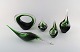 Per Lütken for Holmegaard. Collection of five rare "Flamingo" vases and 
sculptures in green art glass. Danish design, dated 1961.