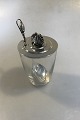 Georg Jensen 
Syltetøjsglas 
med Sterling 
Sølv Låg No 900 
og Magnolia 
Marmeladeske 
Låg diam 7.5 cm 
...