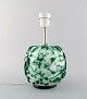 Kastrup / Holmegaard. Rare round table lamp in dark green and white artificial 
glass. Modern design, 1960