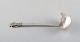 Georg Jensen 
Parallel. Rare 
and early sauce 
spoon in all 
silver.
Measures: 19 
cm.
In very good 
...