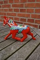 Red Dala horse in trot. One of the more rare dala horses from Sweden. 15 x 20cm