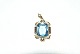Pendant with 
blue stone 14 
carat gold
Stamped: 585 
BH
Height 33.06mm
Wide 17.82 mm
Thickness ...