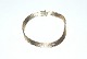 Brick Bracelet, 
7 rd Gold 14 
Karat
Stamped: 585, 
SAV
Length 20.5 
cm.
Width 6.97 ...